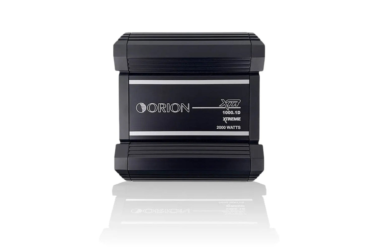 A black ORION XTR1000.1D monoblock class-d amplifier with product information visible on the front.